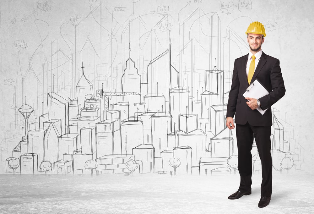 Construction worker with cityscape background drawing